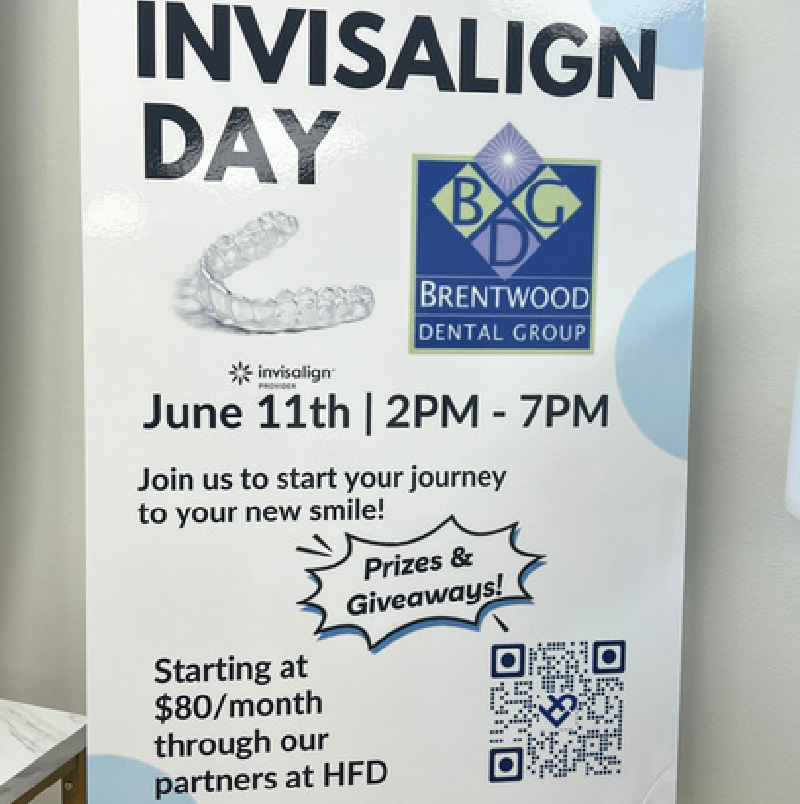 Photo of an in-office poster promoting Invisalign Day